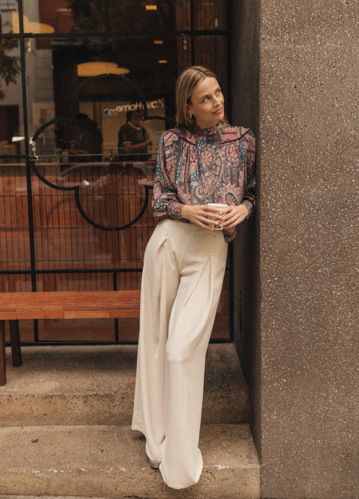 Norfolk paisley shirt, full look leaning against a wall | Cherubina